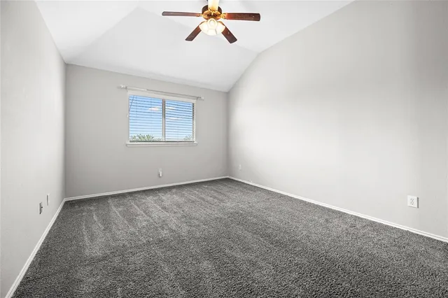 a living room with fireplace furniture and a flat screen tv