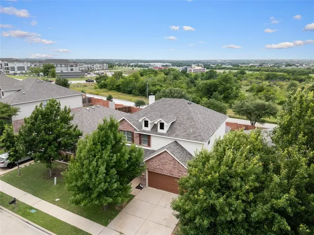 a view of a city with a building in the background