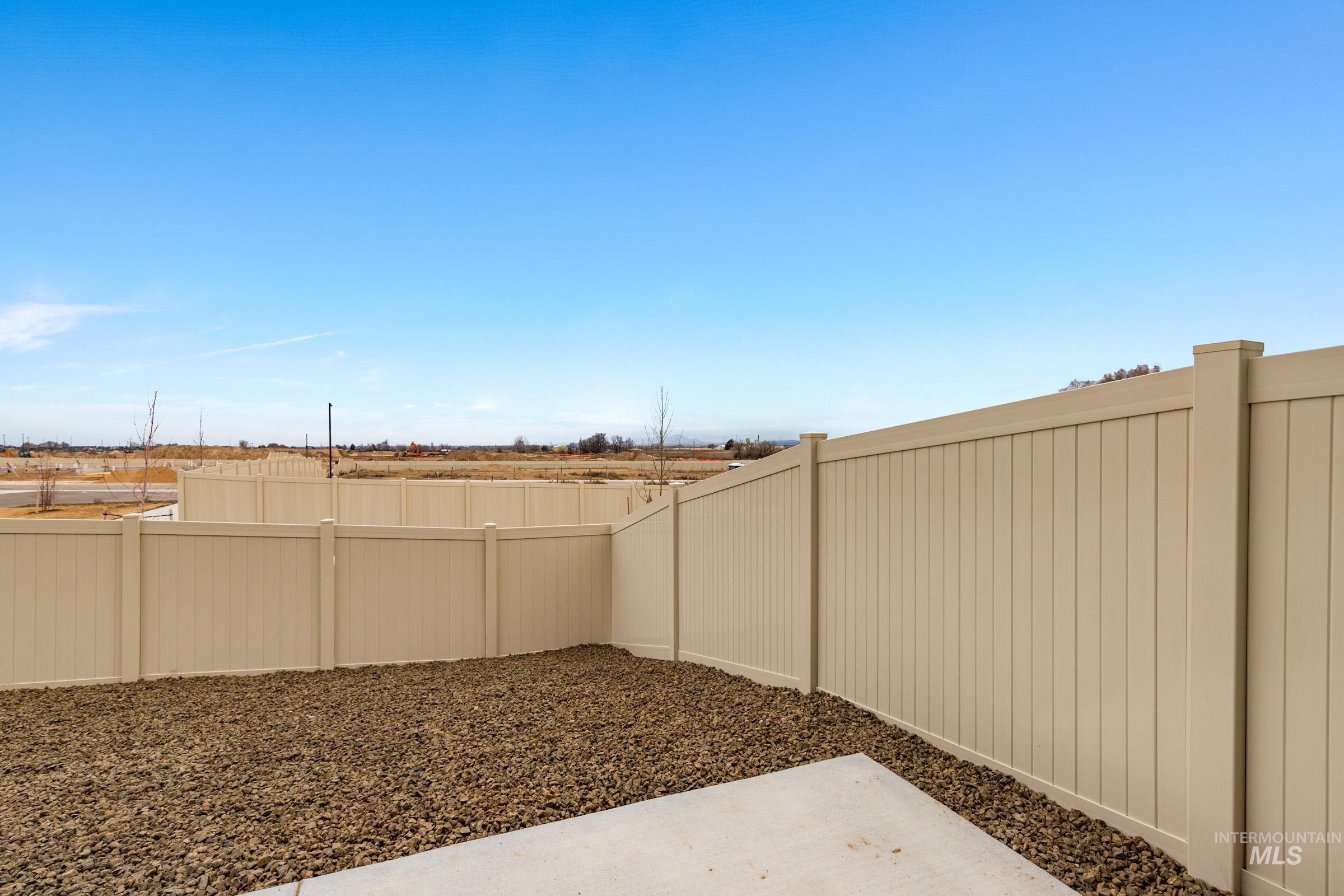 10832 Rutland Street Caldwell, ID 83605 - Photo 19 of 20 Fenced yard featuring a patio area