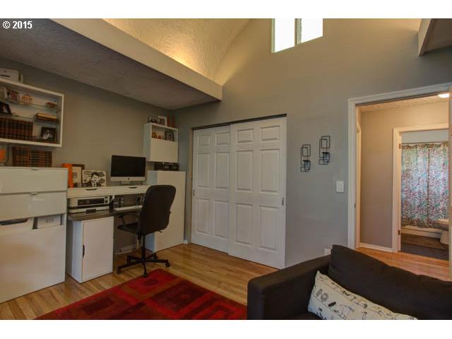 839 Southwest Broadway Drive, Unit 71 Portland, OR 97201 - Photo 9 of 15 a view of a workspace with furniture and wooden floor