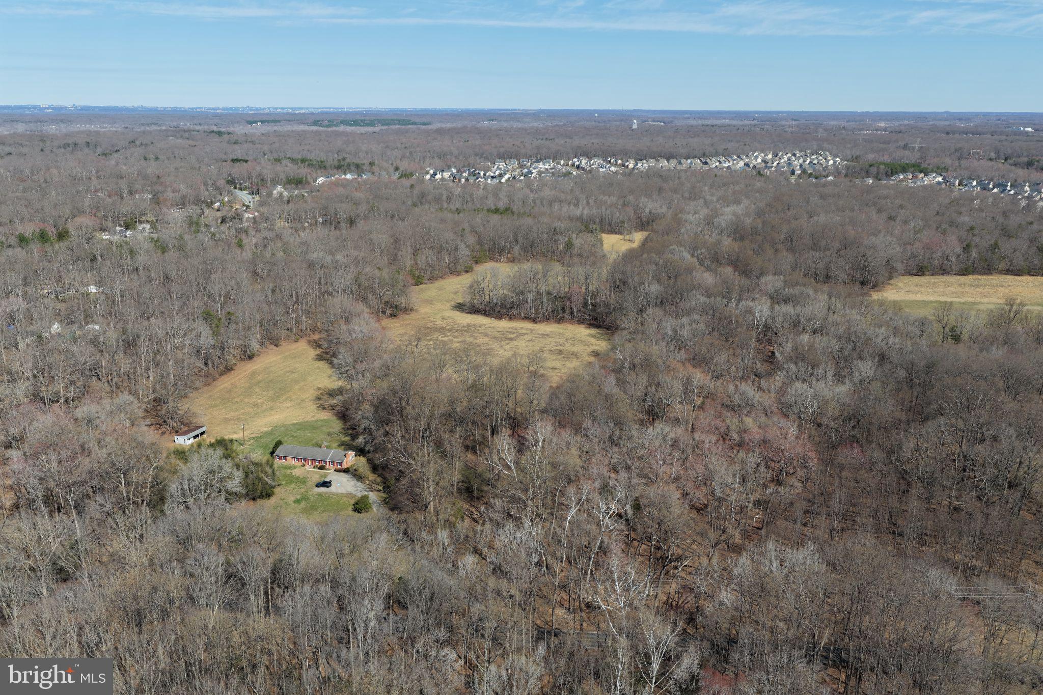 8710 Billingsley Road Waldorf, MD 20603 - Photo 2 of 19 an aerial view of house with yard and mountain view in back