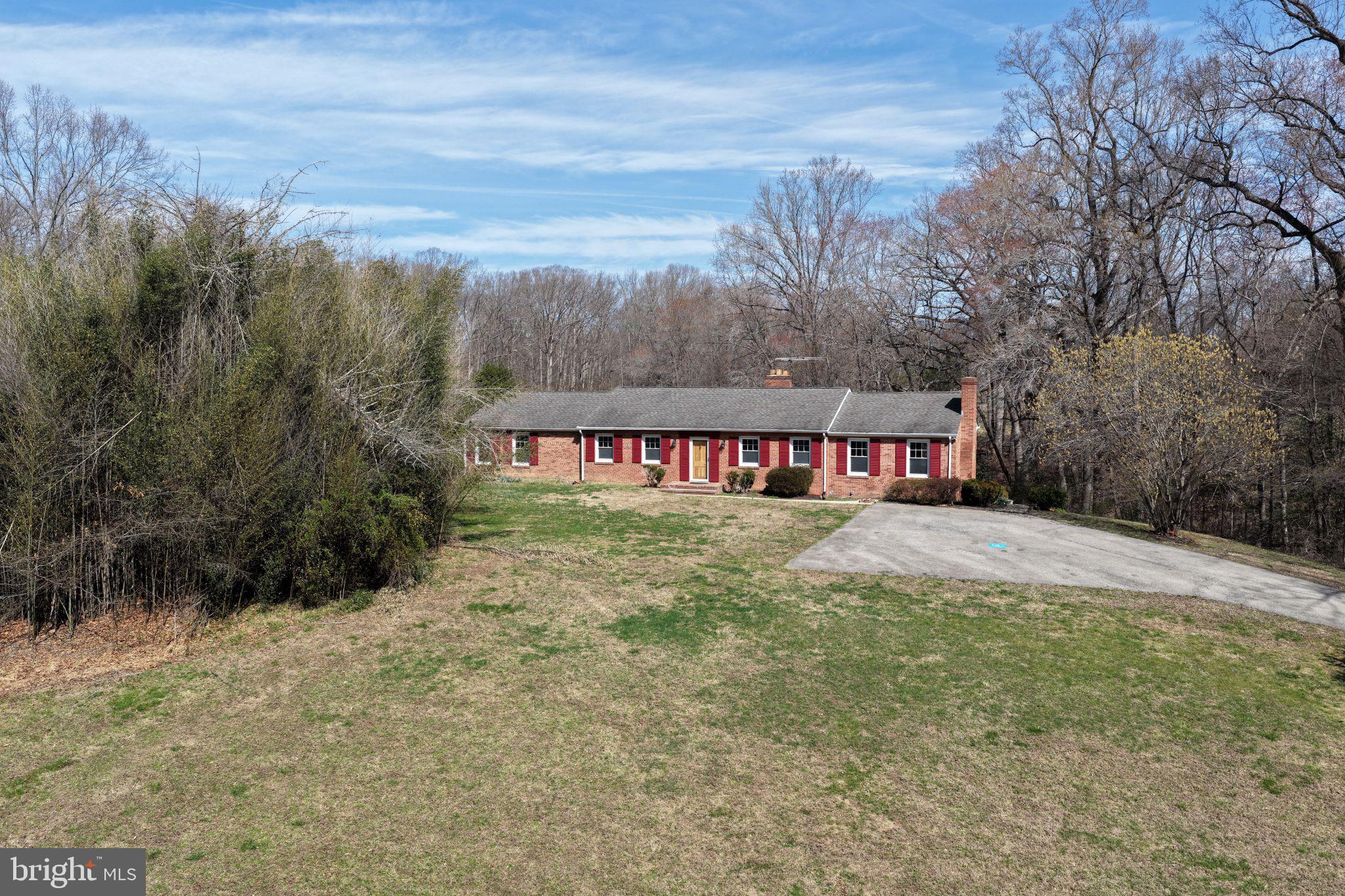8710 Billingsley Road Waldorf, MD 20603 - Photo 5 of 19 a view of a house with a yard