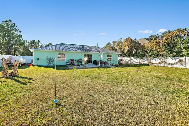 a view of a lake with a house