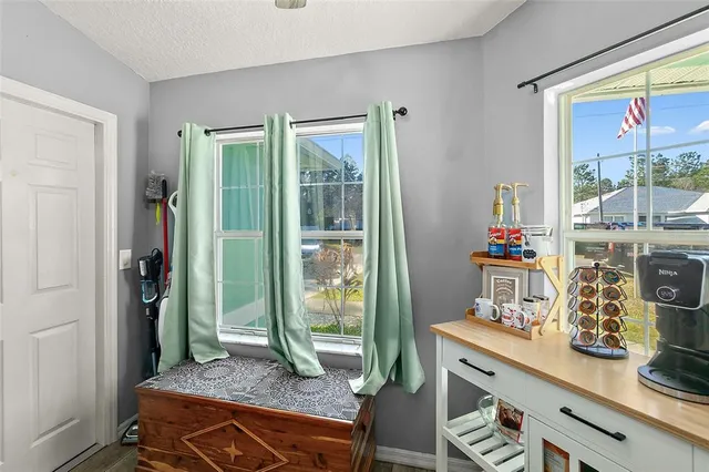 a room with a table and chairs