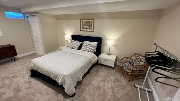 a bedroom with a bed and furniture