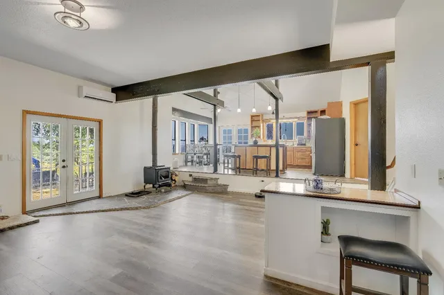 a kitchen with a stove and a refrigerator