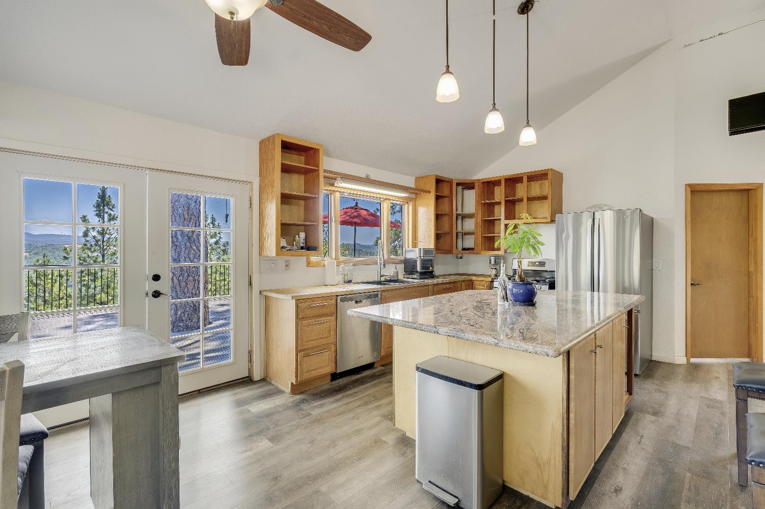 2261 Sand Ridge Road El Dorado, CA 95623 - Photo 13 of 61 a kitchen with stainless steel appliances granite countertop a sink a stove and a refrigerator