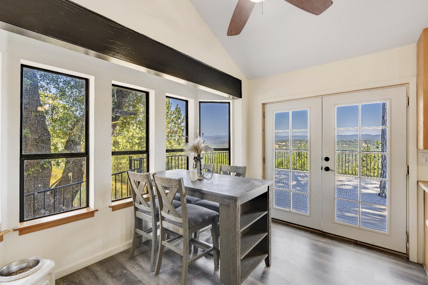 2261 Sand Ridge Road El Dorado, CA 95623 - Photo 17 of 61 a view of a dining room with furniture window and wooden floor