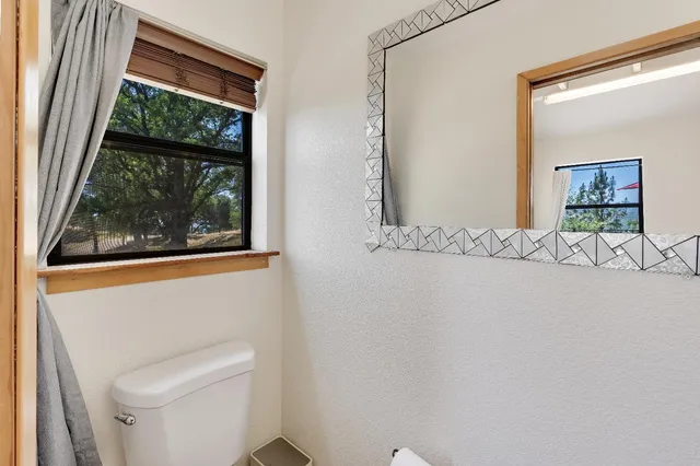 a bathroom with a tub and shower