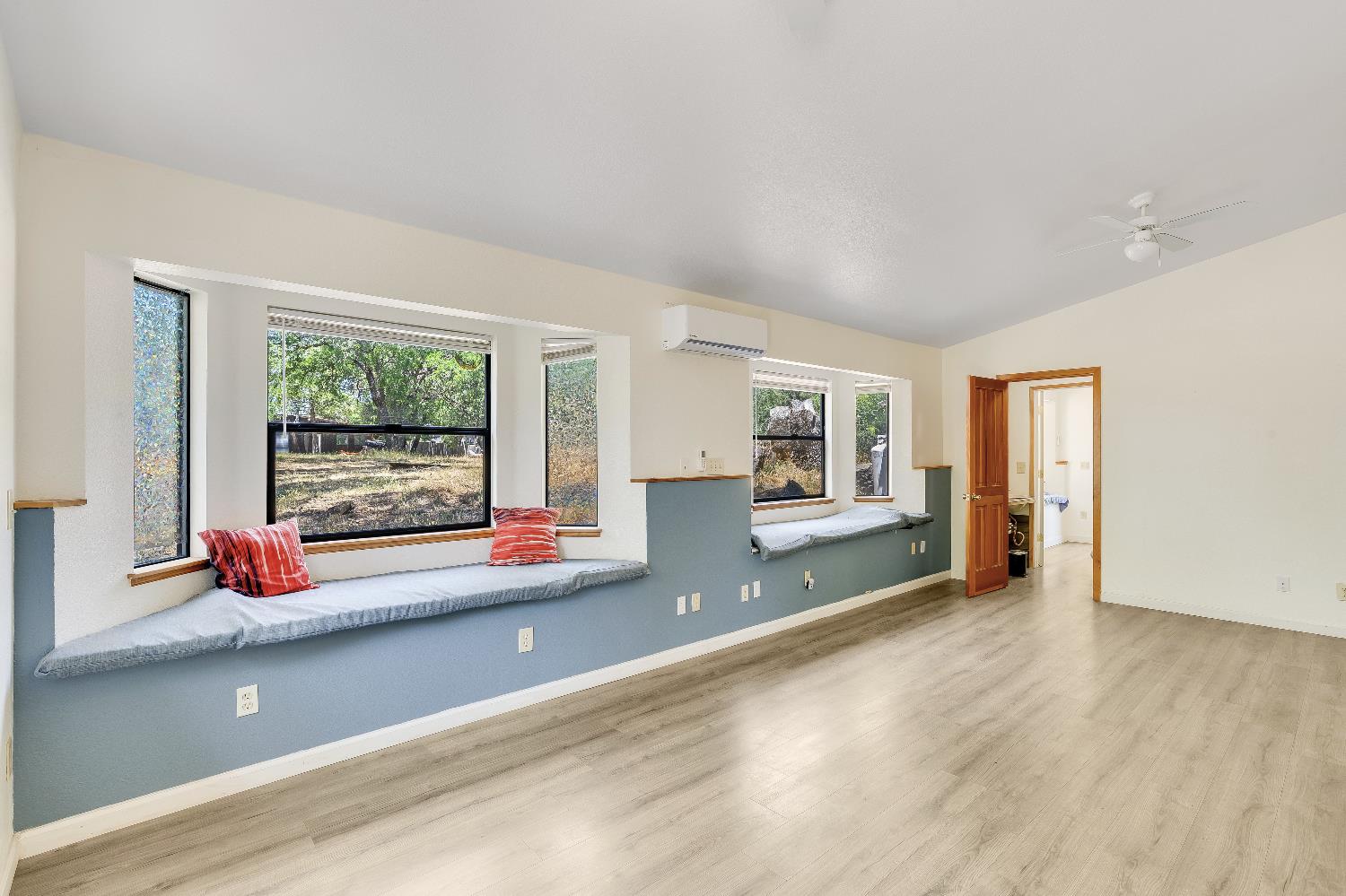 2261 Sand Ridge Road El Dorado, CA 95623 - Photo 29 of 61 wooden floor in an empty room with a window