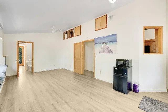 a view of backyard with tree