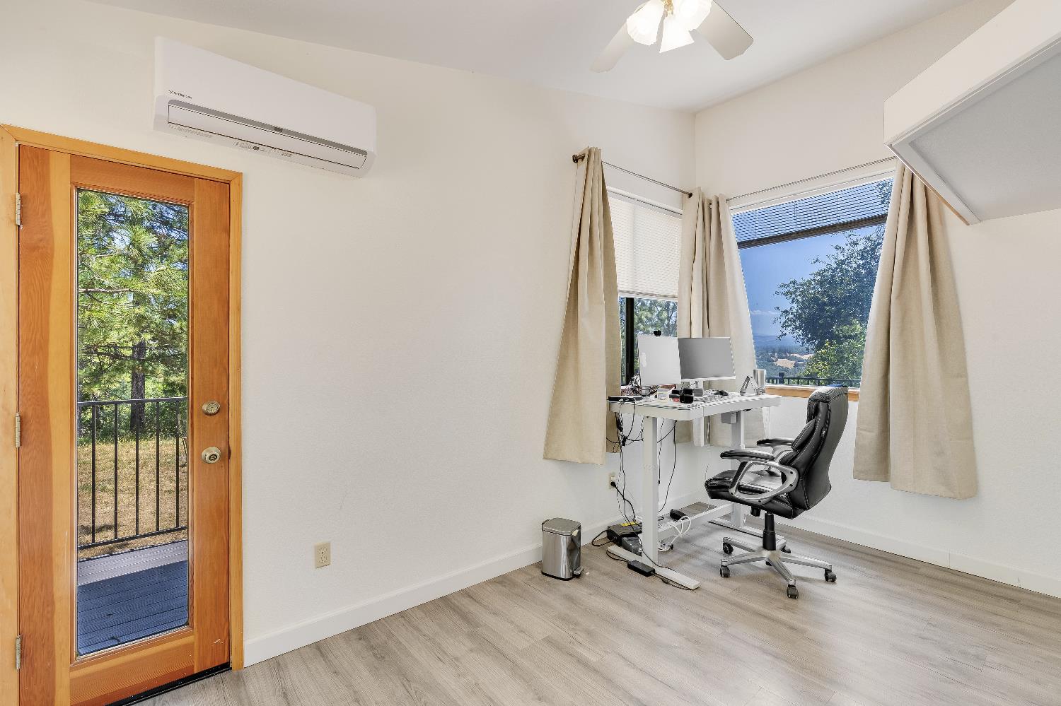 2261 Sand Ridge Road El Dorado, CA 95623 - Photo 34 of 61 a view of a workspace with furniture and a window