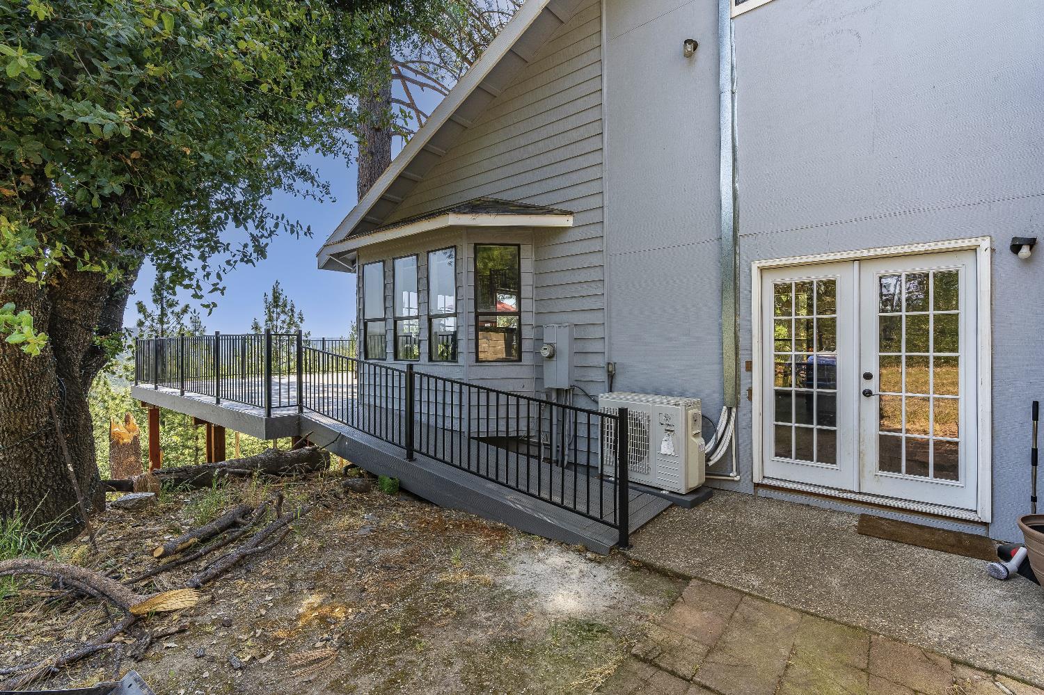 2261 Sand Ridge Road El Dorado, CA 95623 - Photo 39 of 61 a view of a house with a wooden fence