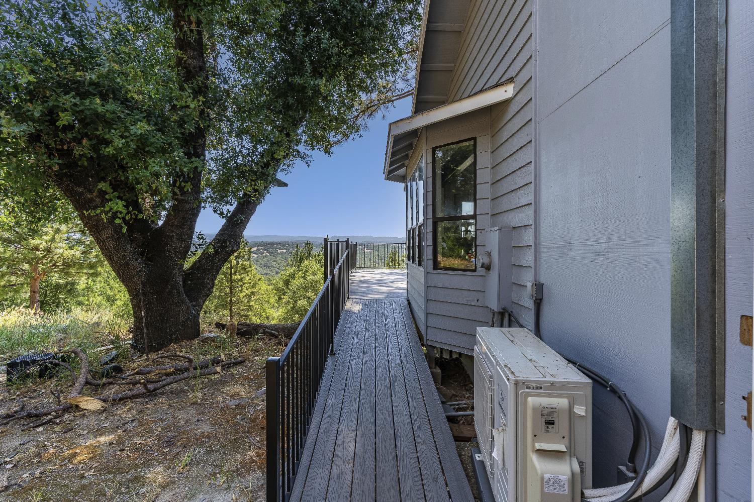 2261 Sand Ridge Road El Dorado, CA 95623 - Photo 40 of 61 a view of balcony with wooden floor and fence