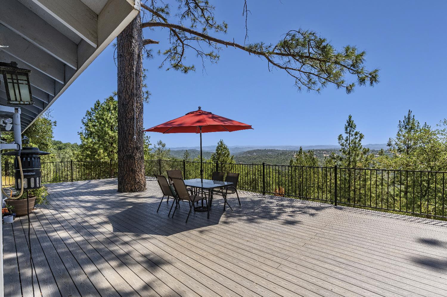 2261 Sand Ridge Road El Dorado, CA 95623 - Photo 43 of 61 a view of a patio with a table and chairs