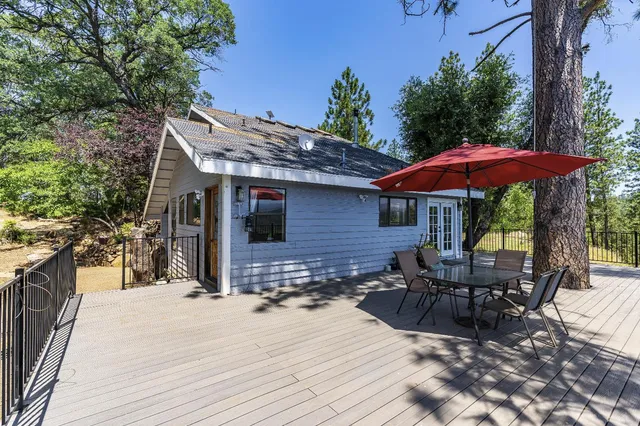 a view of a city with lush green forest