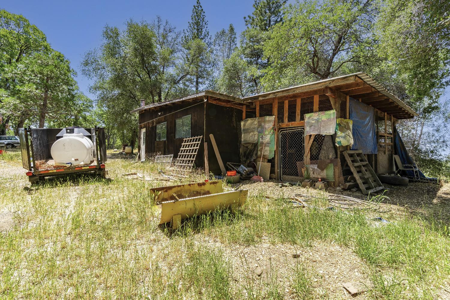 2261 Sand Ridge Road El Dorado, CA 95623 - Photo 51 of 61 a view of house with swimming pool and garden