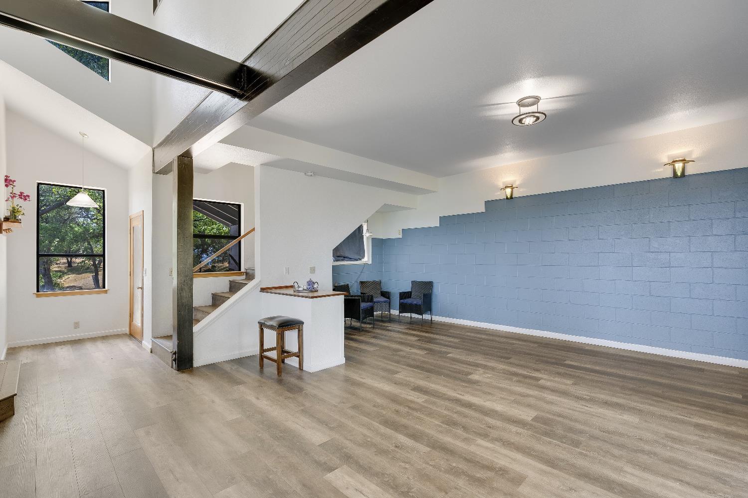 2261 Sand Ridge Road El Dorado, CA 95623 - Photo 10 of 61 a view of a livingroom with furniture and a workspace