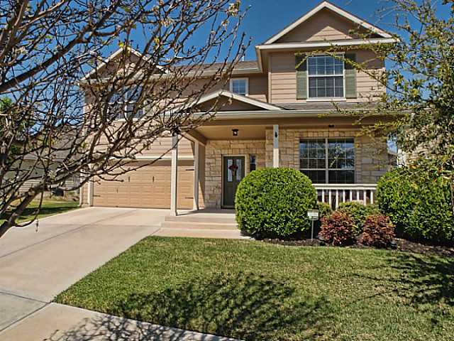 1113 Boxwood Loop Georgetown, TX 78628 - Photo 1 of 1 a front view of a house with garden