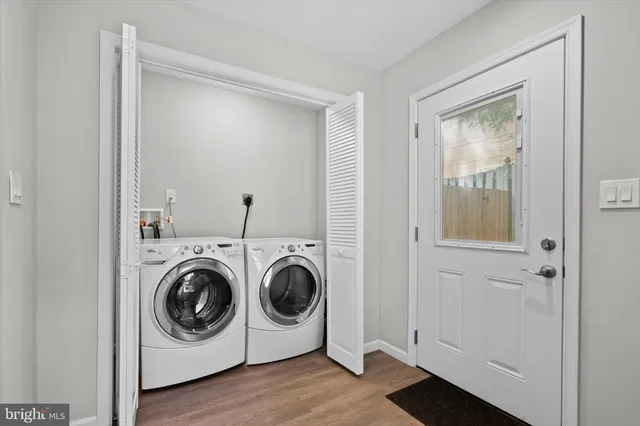 a utility room with dryer and washer