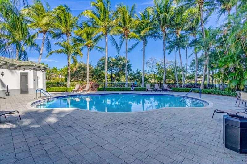 3110 Renaissance Way, Unit 110 Boynton Beach, FL 33426 - Photo 39 of 45 a view of swimming pool with a patio