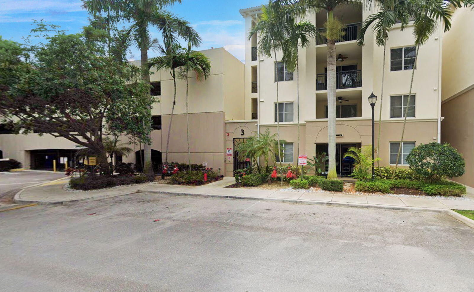 3110 Renaissance Way, Unit 110 Boynton Beach, FL 33426 - Photo 4 of 45 front view of a building with a street