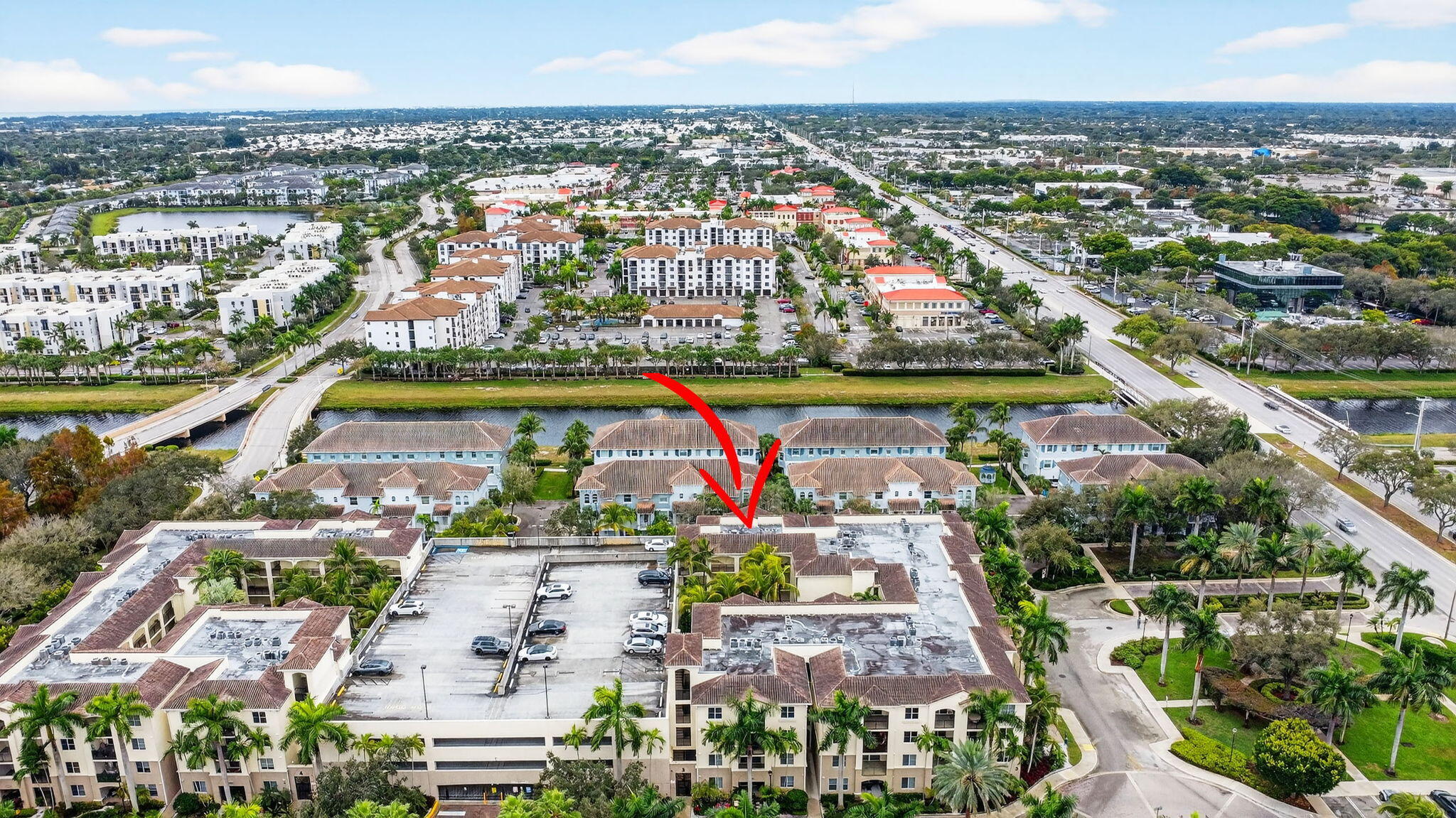 3110 Renaissance Way, Unit 110 Boynton Beach, FL 33426 - Photo 43 of 45 an aerial view of residential building and lake