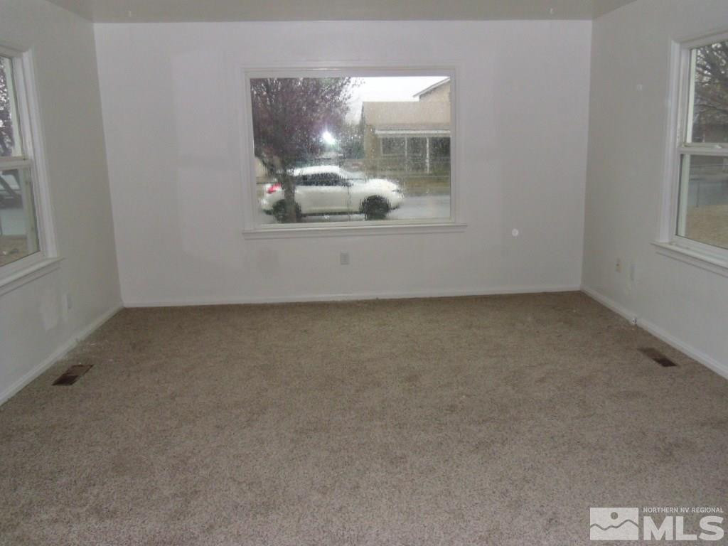 1335 Oliver Avenue Reno, NV 89512 - Photo 3 of 11 an empty room with window