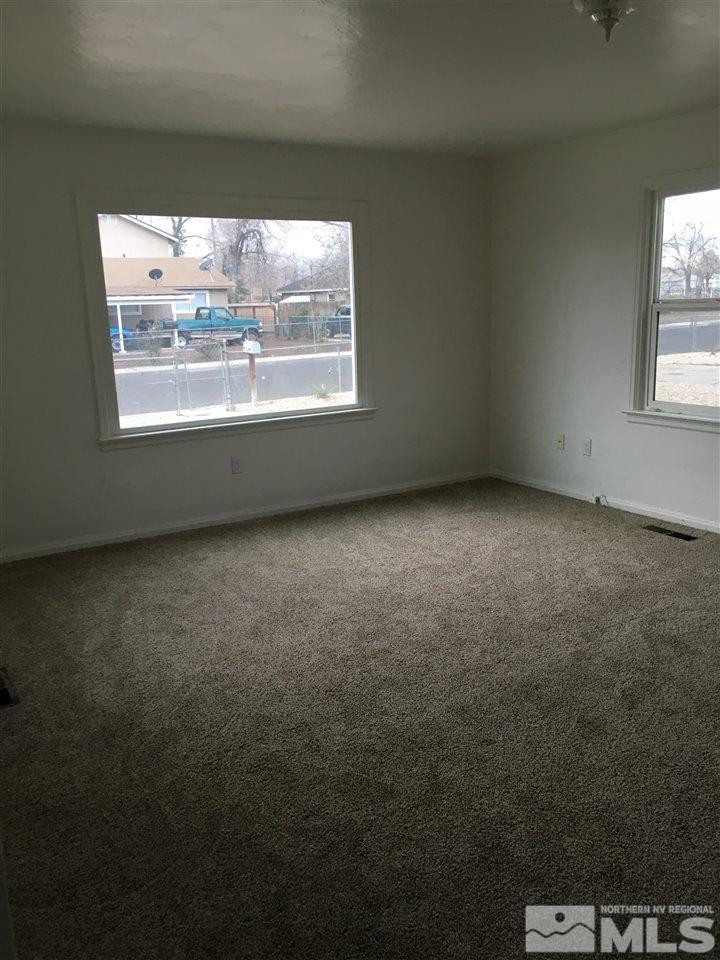 1335 Oliver Avenue Reno, NV 89512 - Photo 4 of 11 an empty room with a window