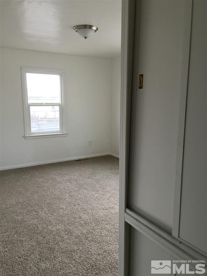 1335 Oliver Avenue Reno, NV 89512 - Photo 8 of 11 an empty room with a window