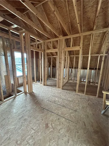 a view of an empty room with glass door