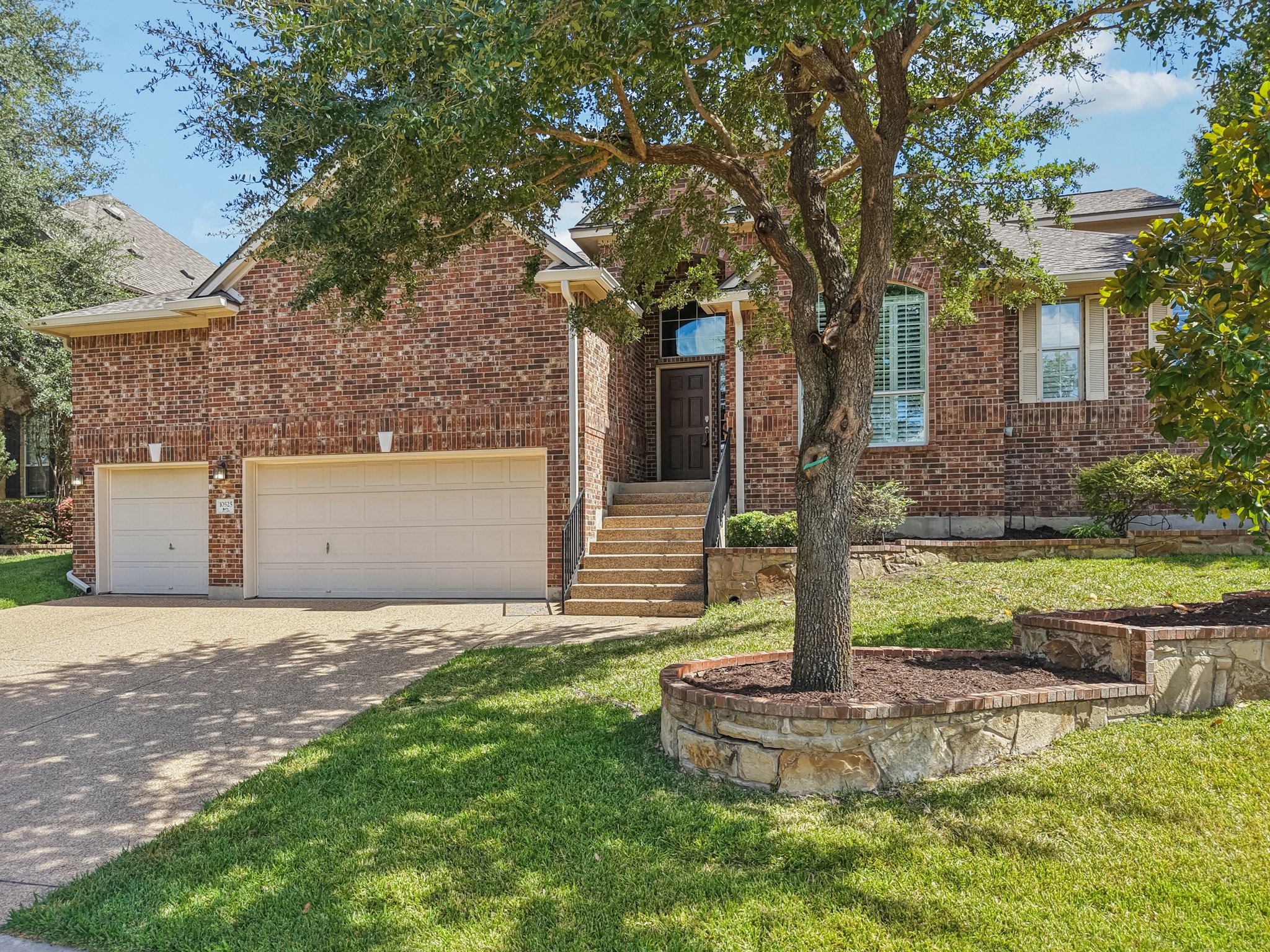 10525 Roy Butler Drive Austin, TX 78717 - Photo 5 of 40 3 Car Garage with plenty of storage