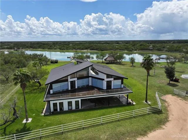 a house with river in front of it
