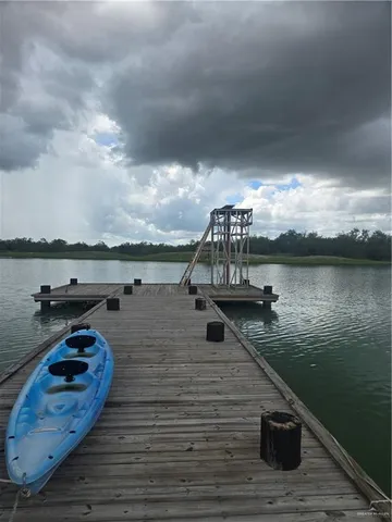 a view of a lake with a yard