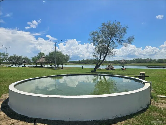 a view of a golf course with a lake