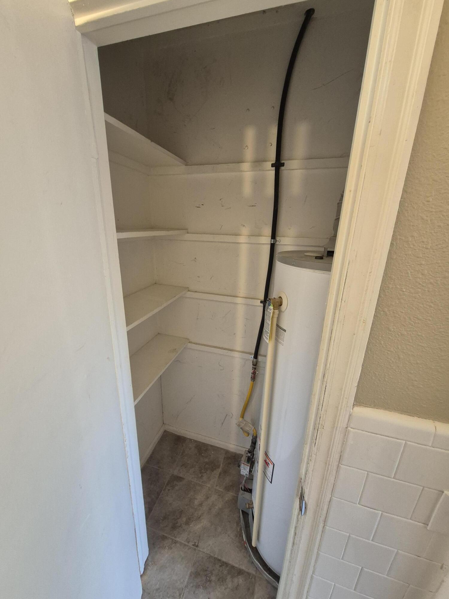 1714 42nd Street Lubbock, TX 79412 - Photo 12 of 16 a bathroom with a shower