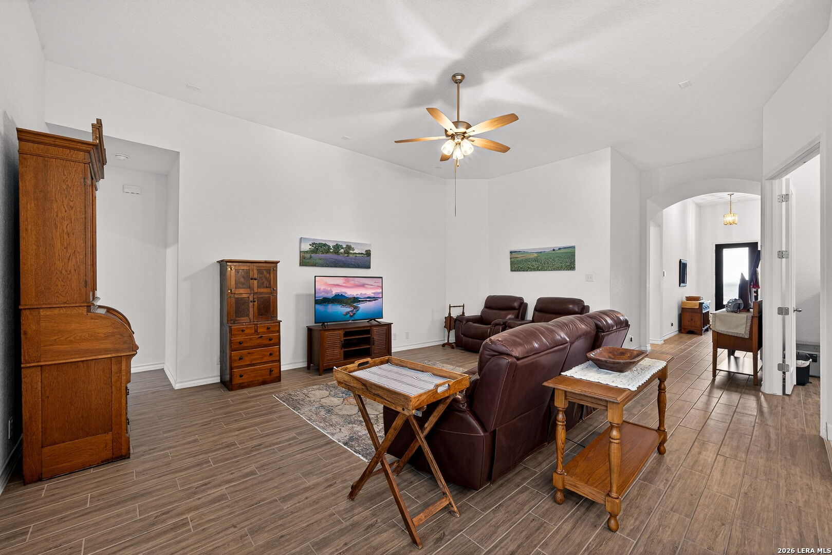 3146 Stokesay Bulverde, TX 78163 - Photo 11 of 30 a living room with furniture and wooden floor