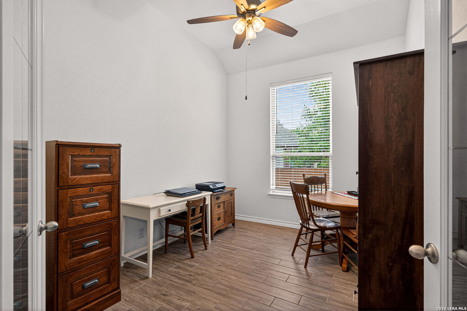 3146 Stokesay Bulverde, TX 78163 - Photo 16 of 30 a view of a workspace with furniture and a window