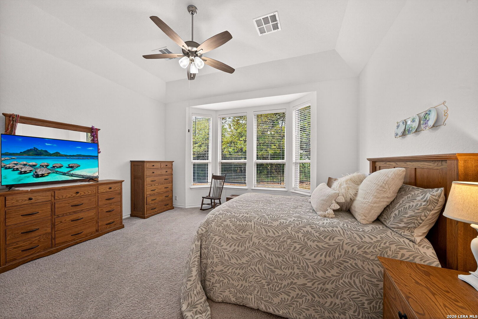 3146 Stokesay Bulverde, TX 78163 - Photo 19 of 30 a bedroom with a bed and window