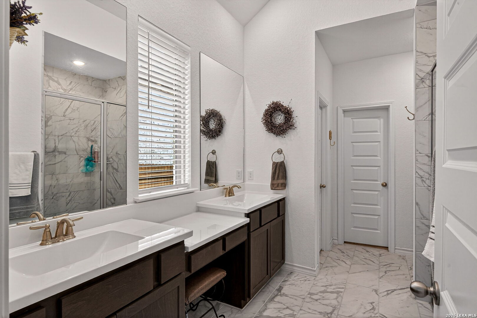 3146 Stokesay Bulverde, TX 78163 - Photo 20 of 30 a bathroom with a sink and a mirror