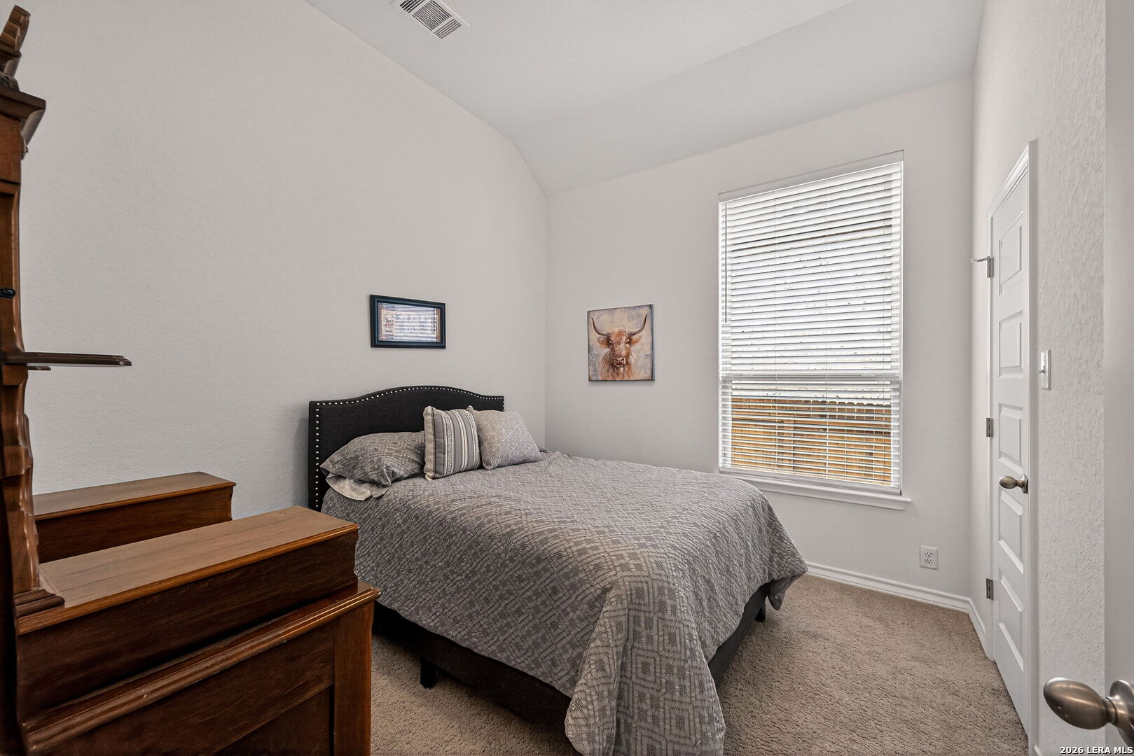 3146 Stokesay Bulverde, TX 78163 - Photo 24 of 30 a bedroom with a bed and a night stand