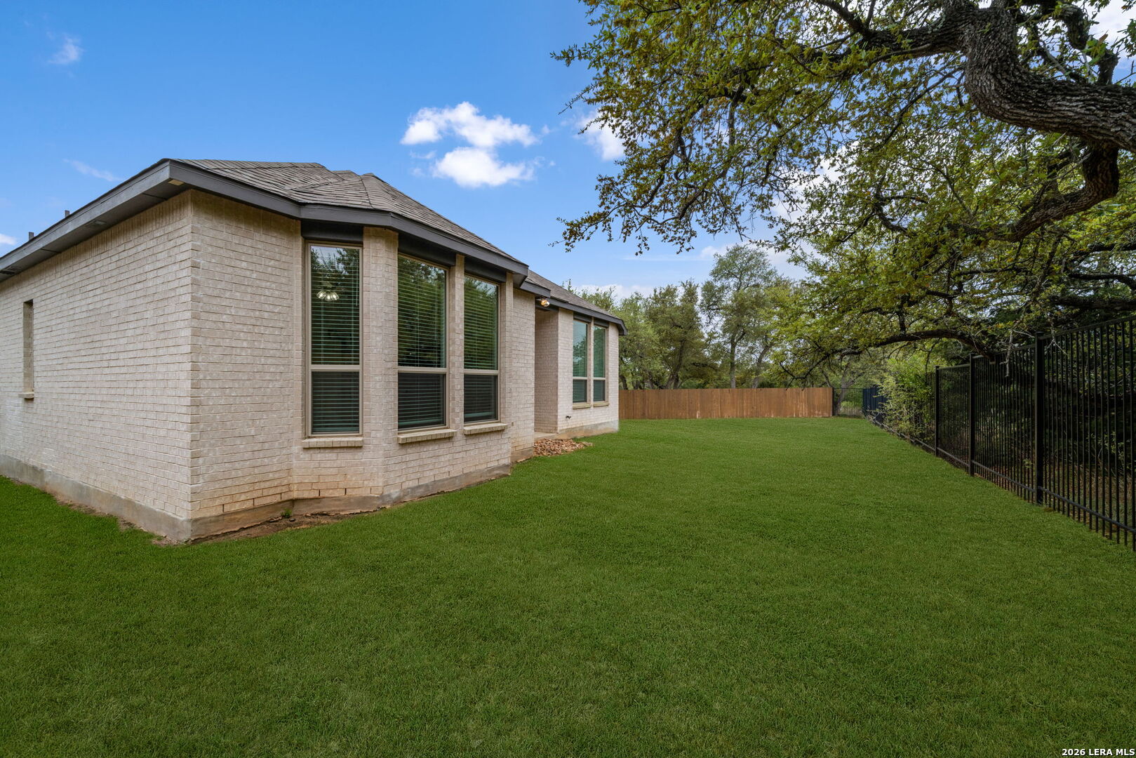 3146 Stokesay Bulverde, TX 78163 - Photo 28 of 30 a view of house with backyard and garden