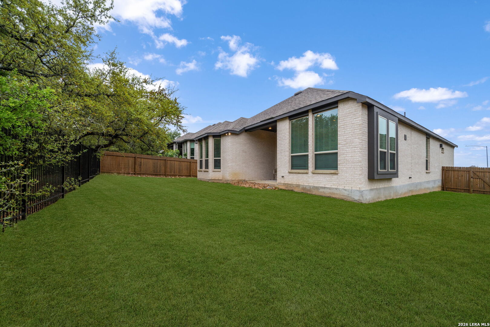 3146 Stokesay Bulverde, TX 78163 - Photo 29 of 30 a front view of house with a garden