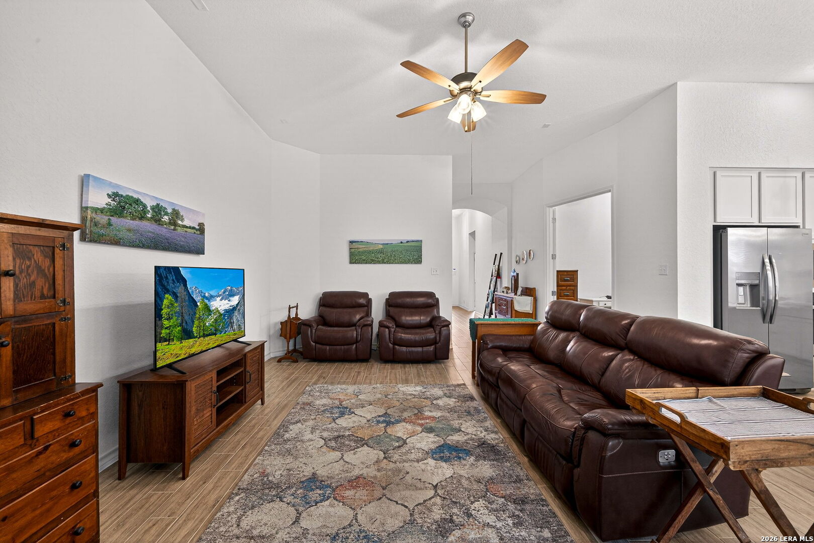 3146 Stokesay Bulverde, TX 78163 - Photo 4 of 30 a living room with furniture and a flat screen tv