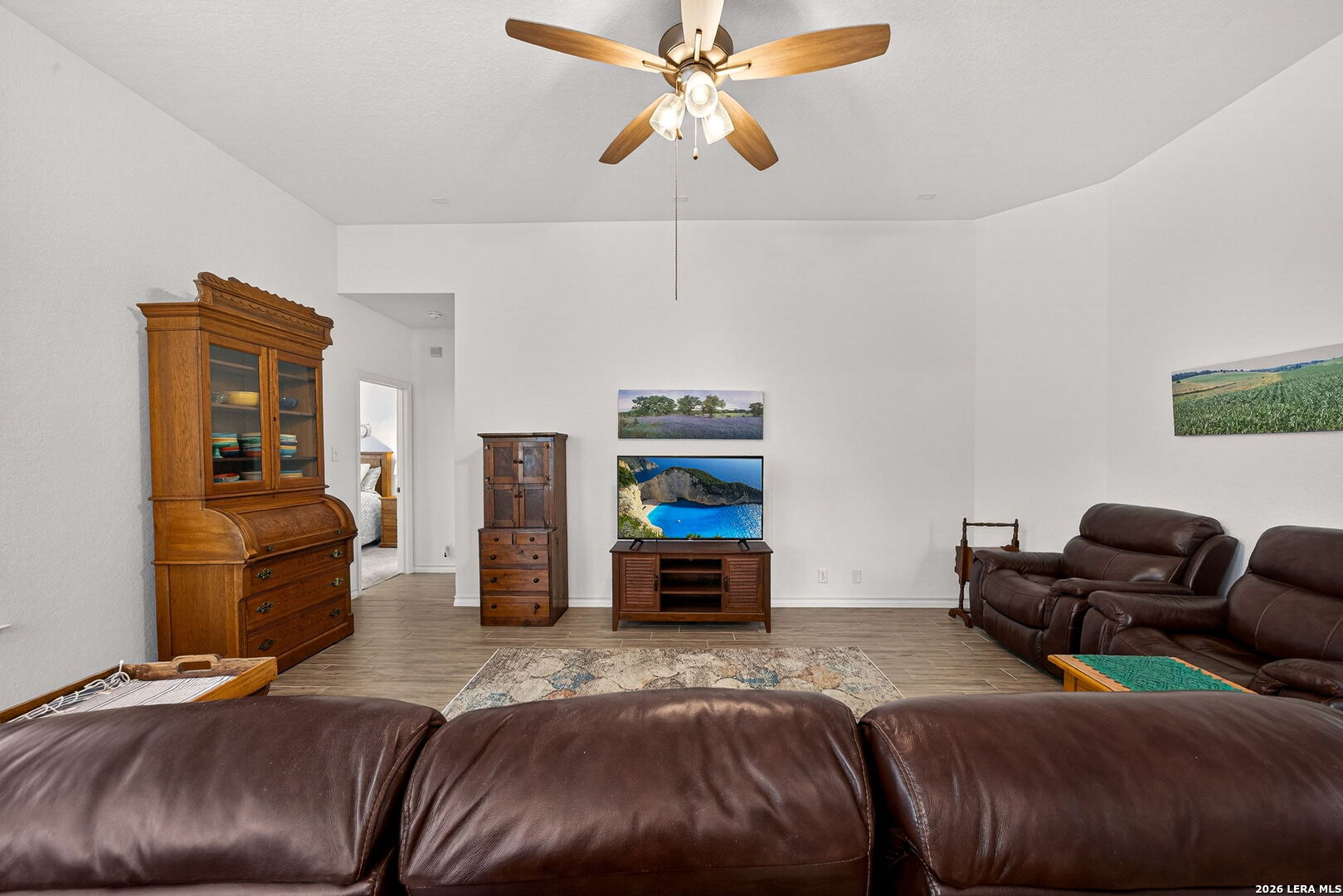 3146 Stokesay Bulverde, TX 78163 - Photo 10 of 30 a bedroom with bed and a couch