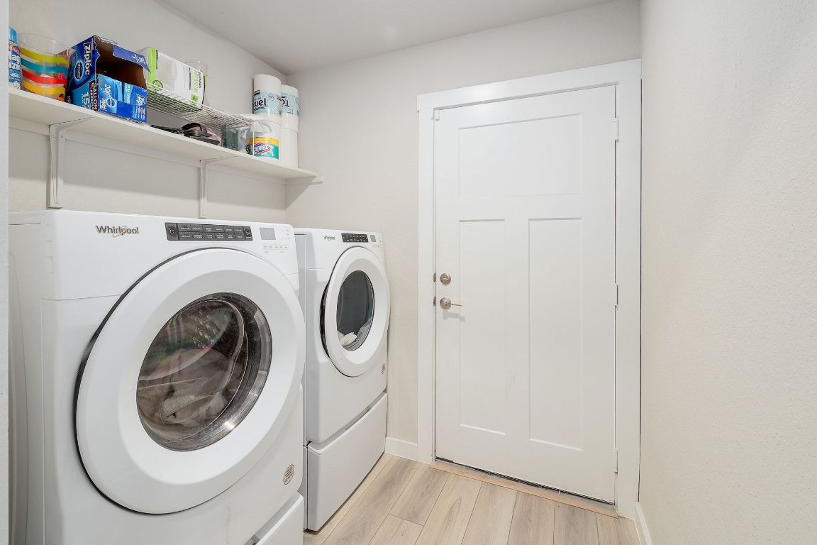 204 Halford Road Georgetown, TX 78633 - Photo 21 of 27 a utility room with dryer and washer