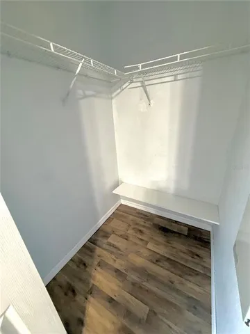 a kitchen with kitchen island sink refrigerator and stove