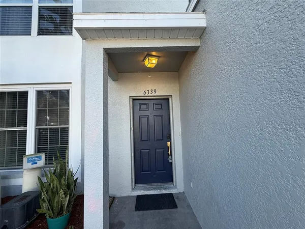a view of a entryway door of the house