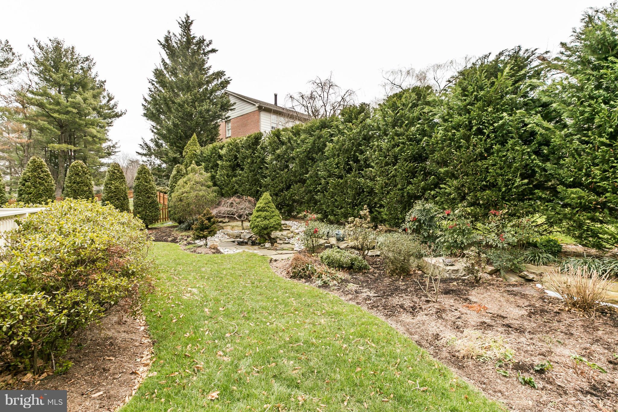 109 Charlesbrooke Road Baltimore, MD 21212 - Photo 27 of 30 a view of a yard with large trees