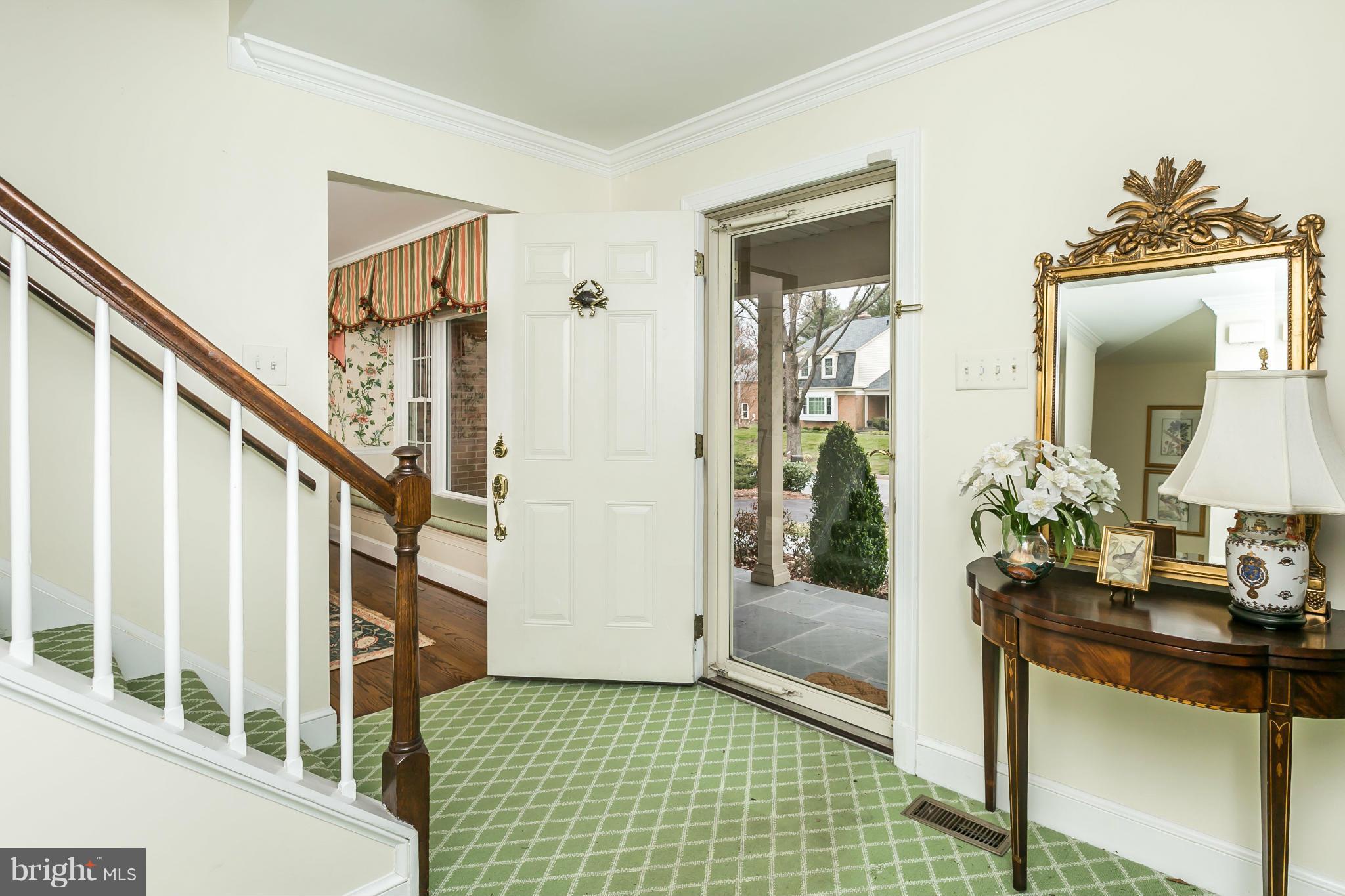 109 Charlesbrooke Road Baltimore, MD 21212 - Photo 5 of 30 a view of a hallway view with wooden floor and staircase